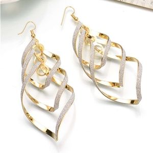 Gold and silver twist drop earrings